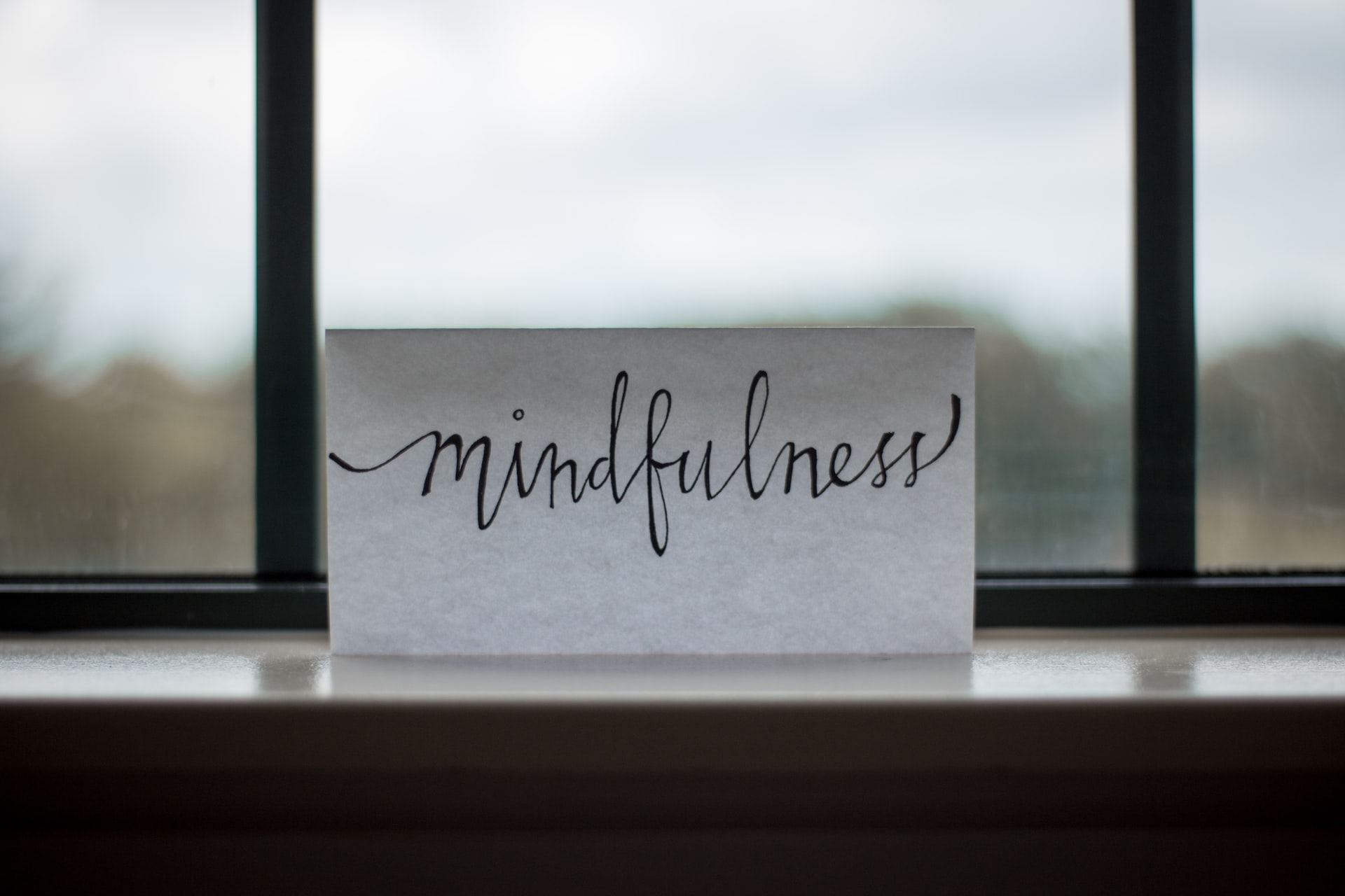 piece of paper with mindfulness written on